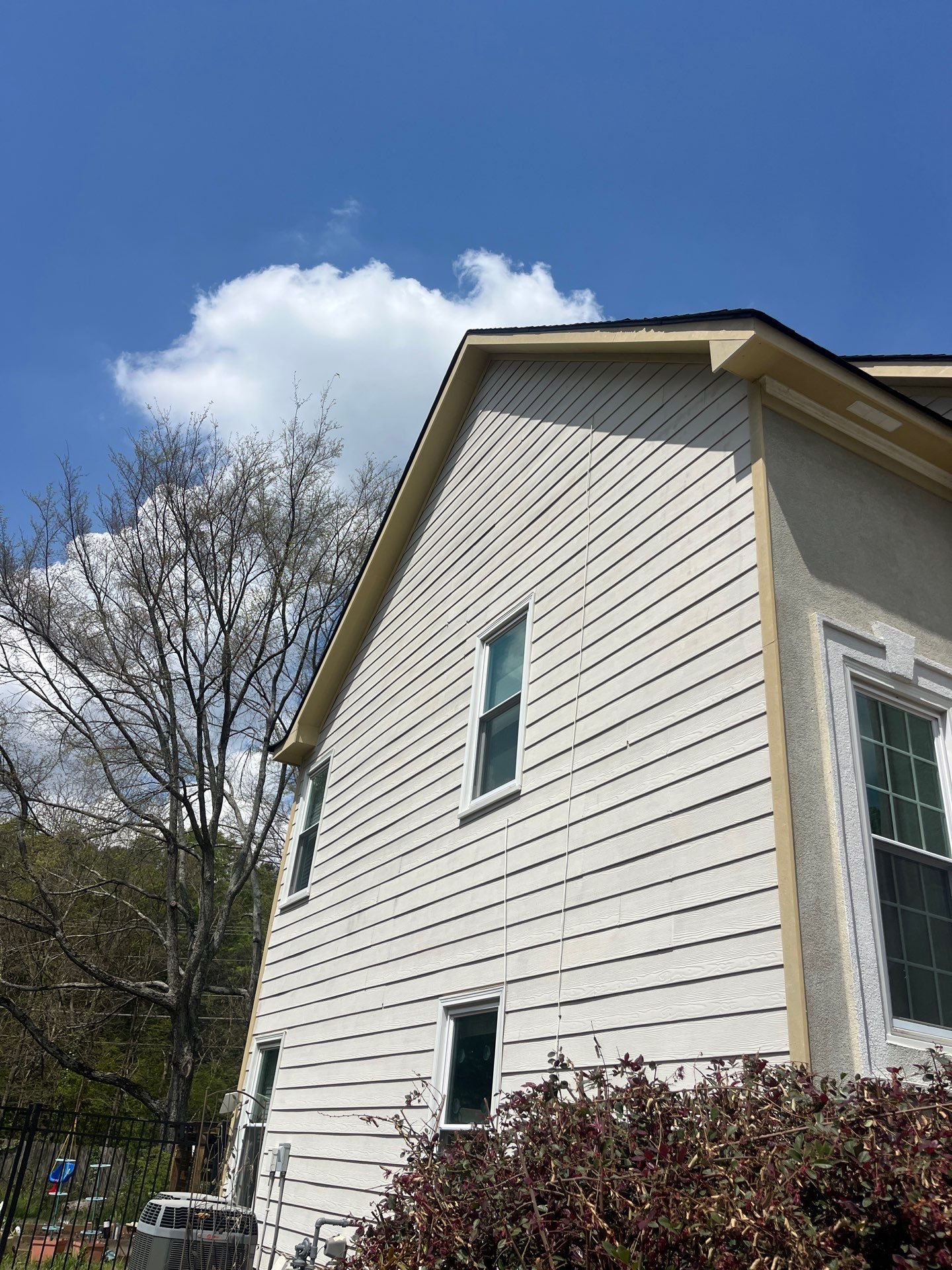 Marietta, GA Chimney Siding, Fascia, and Soffit Replacement using James Hardie Lap Siding, Hardie Trim, and Hardie Panel by Nelson Exteriors 