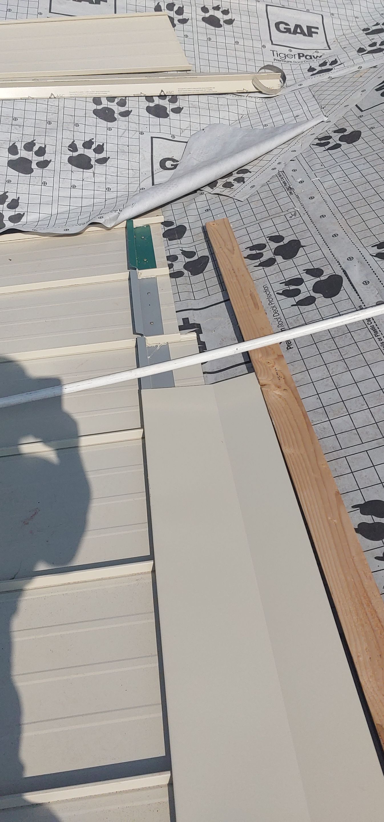 Residential Roofing Installation using Standing seam metal roofing system by Straight Edge Roofing Inc