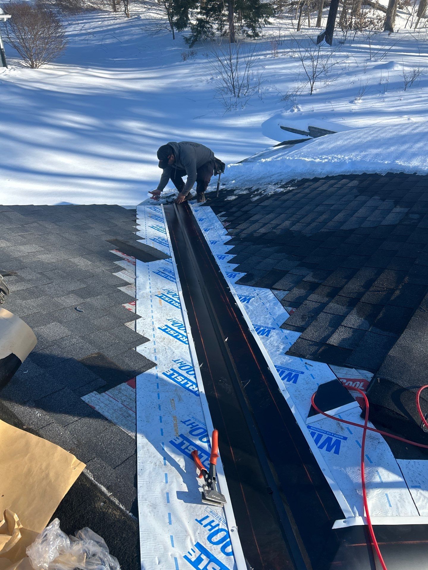 Ridge Cap Replacement & Black Metal Valley Installation in Chelmsford, MA by Mighty Dog Roofing of Greater Middlesex County