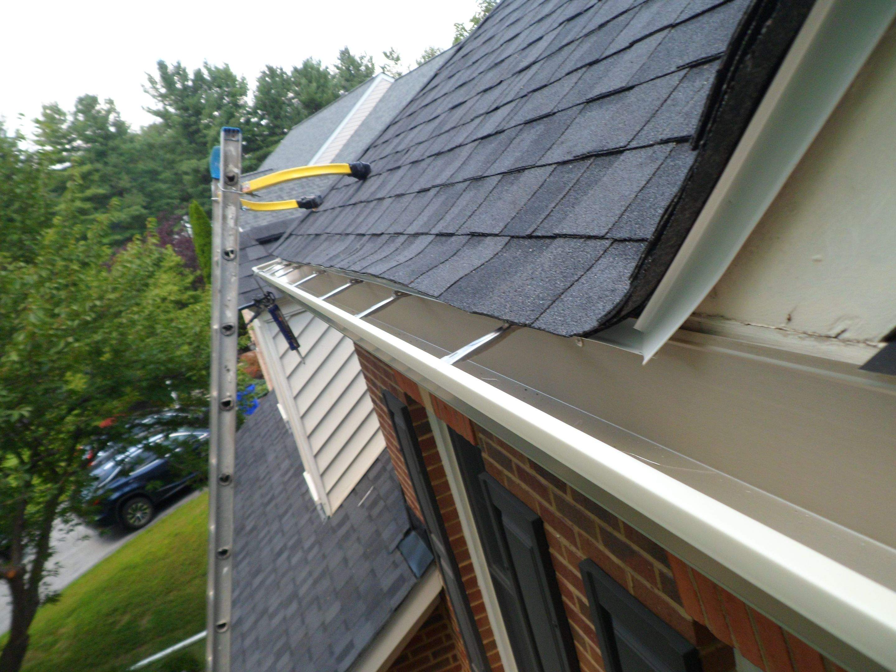 New Shingle Roof & New Gutters and downspouts with covers by Alpha Design Services