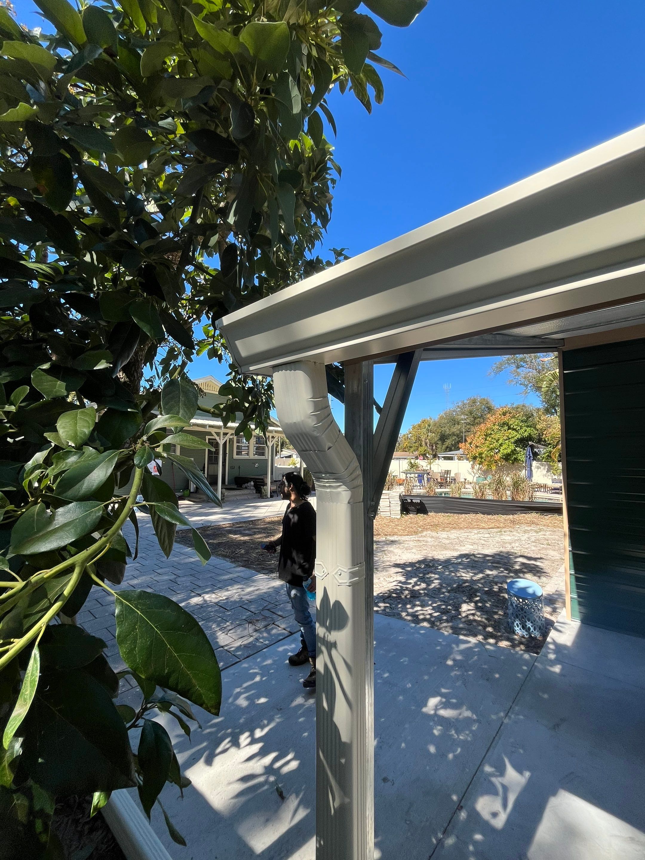 White 6-inch K-style Gutters and Down Spouts using Seamless Gutters White Down Spouts in Tampa FL by Gutter Professors