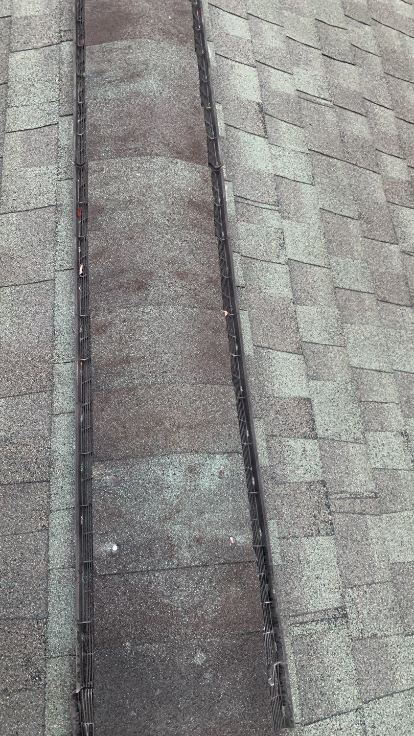 Hail Damage using Atlas Pristine Pinnacle Shingles by Artigues Roofing & Restoration Services