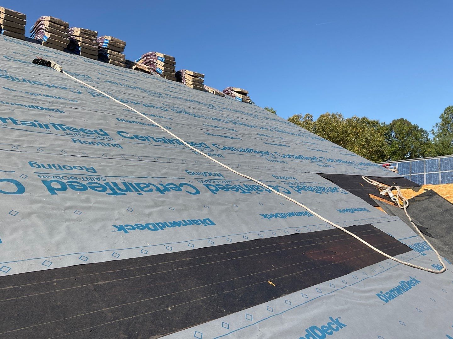 Residential Roofing Installation by Alpha Design Services
