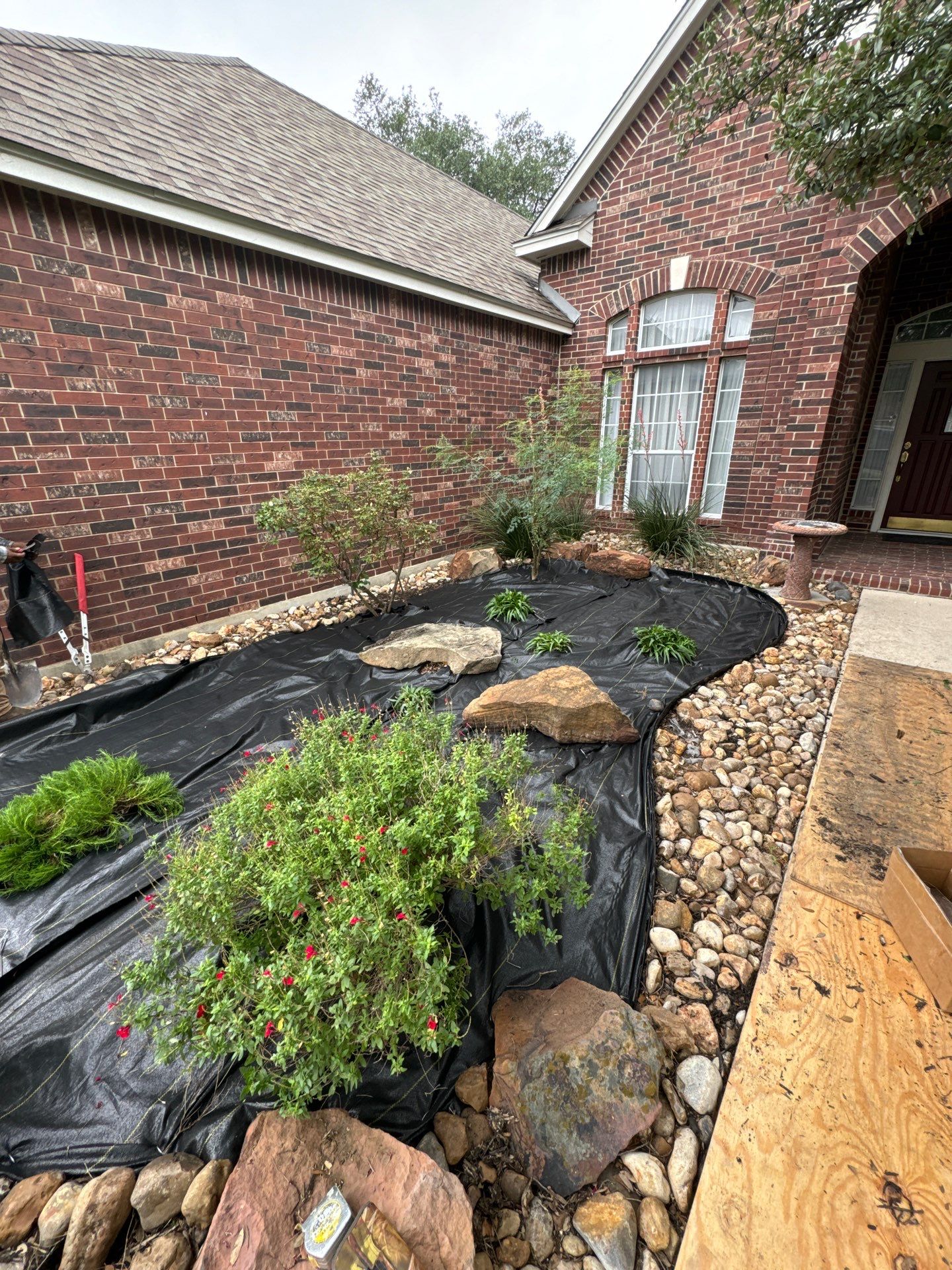 Landscaping Enhancement  using Texas Black Gravel by Hole In One Lawns, LLC