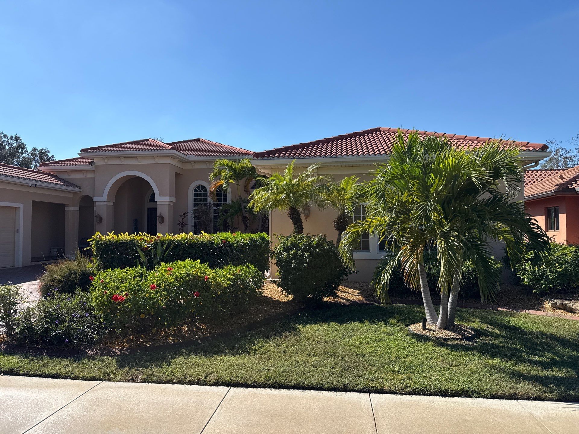 Tile Roof Cleaning & Oil Stain Removal | Tara River Place, Bradenton FL by Sunshine AquaWash