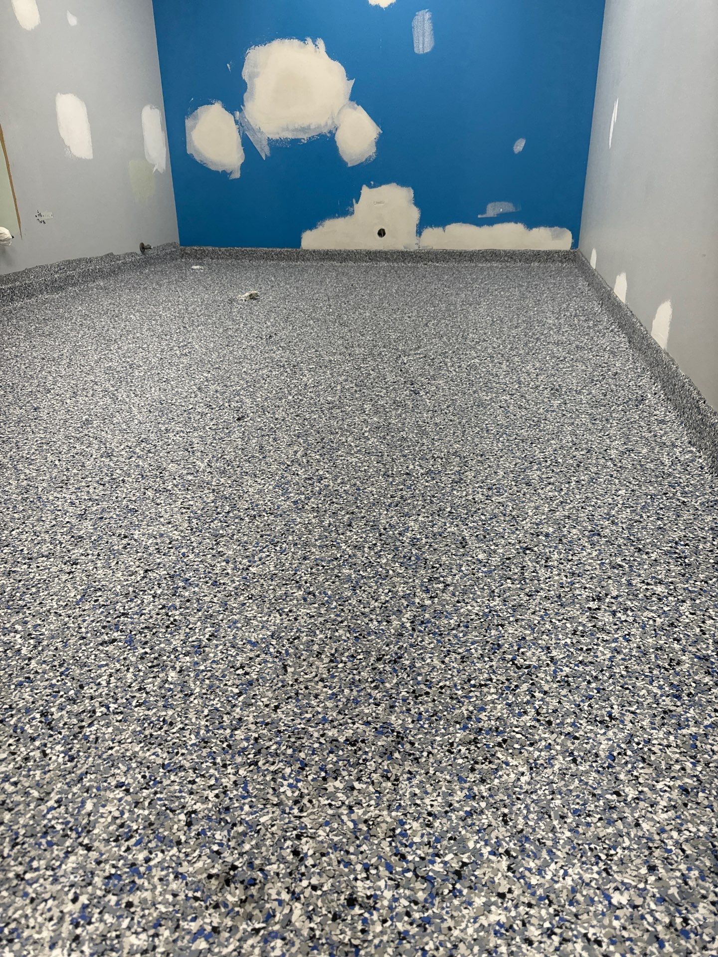 Epoxy Floor in Shop Bathroom by Gordon Painting
