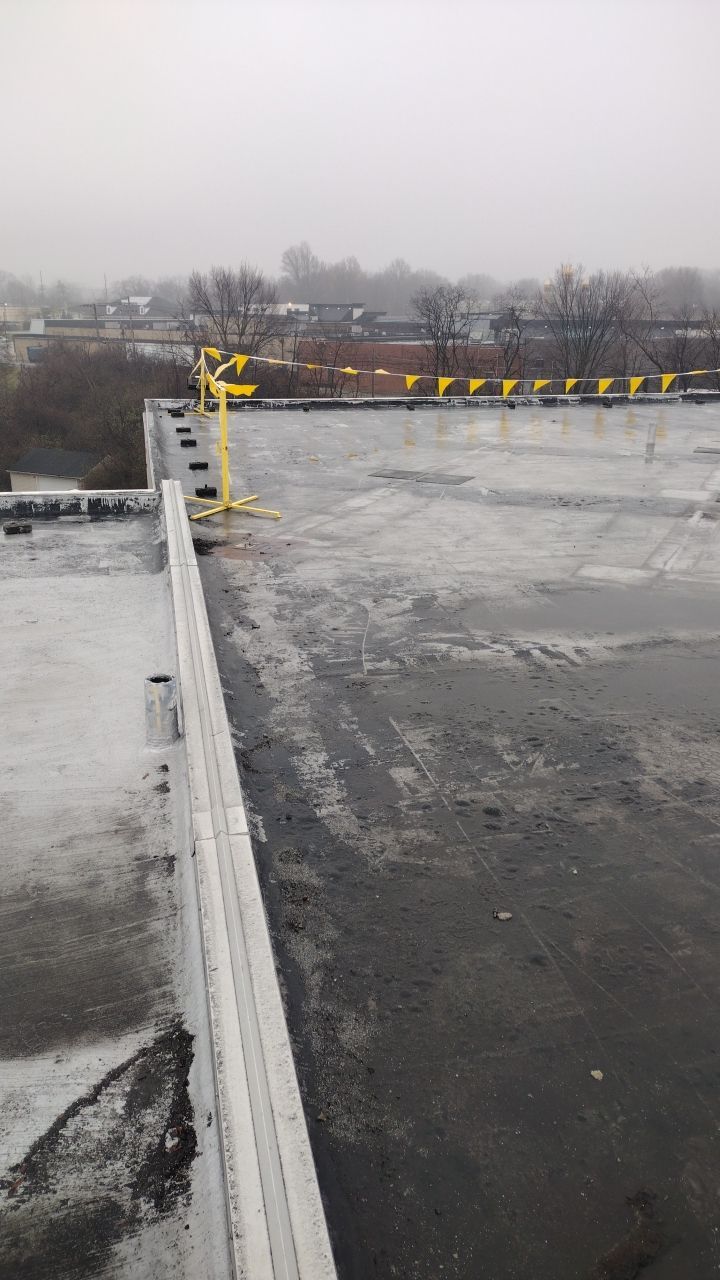 Commercial flat roof parma by Absolute Roofing and Construction