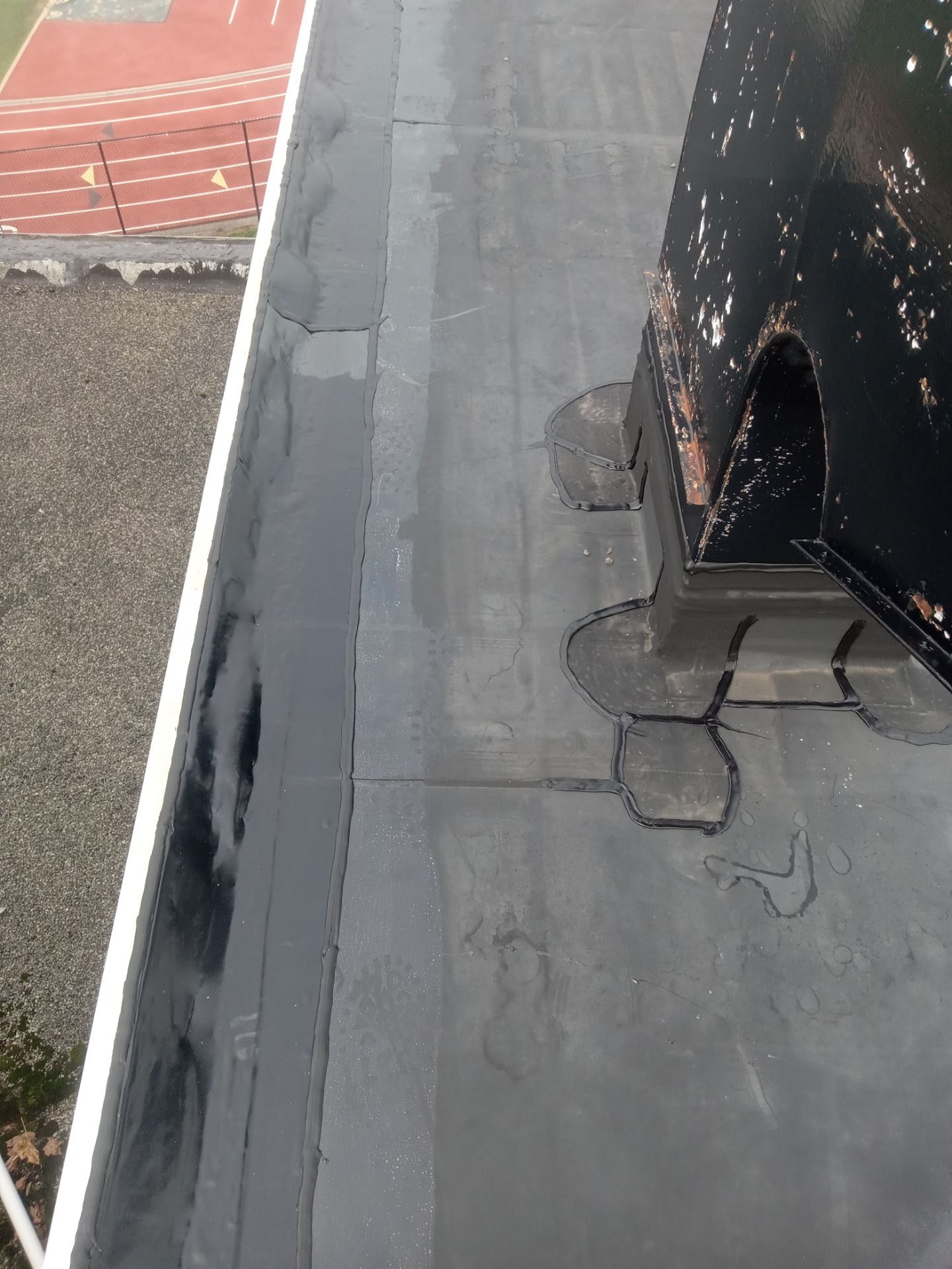 Commercial Roofing using Roof Replacement by Absolute Roofing and Construction