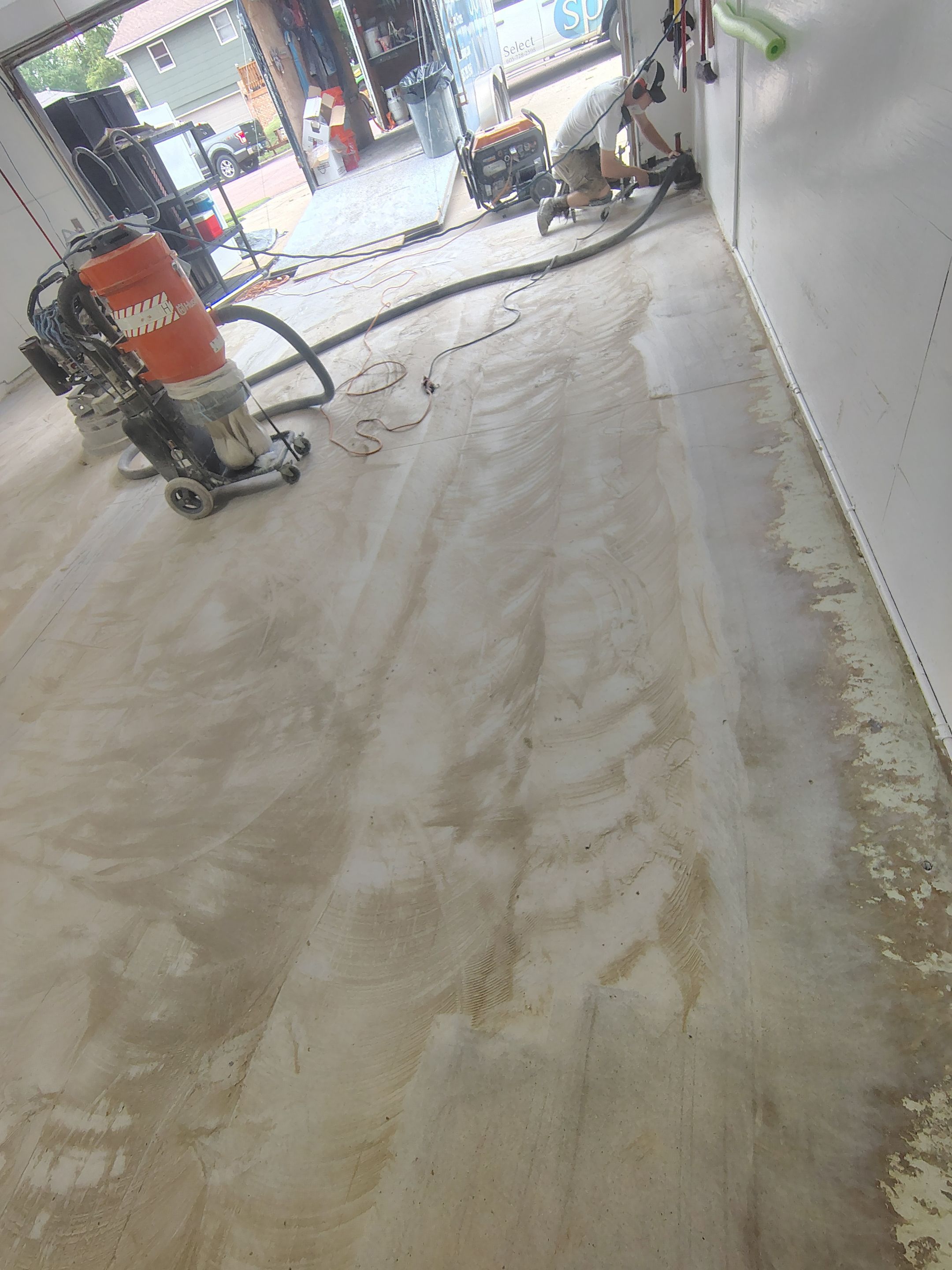 Yankton Garage Concrete Coating With Feather Gray Decorative Chips by Select Painting, Coatings & Garage Cabinets
