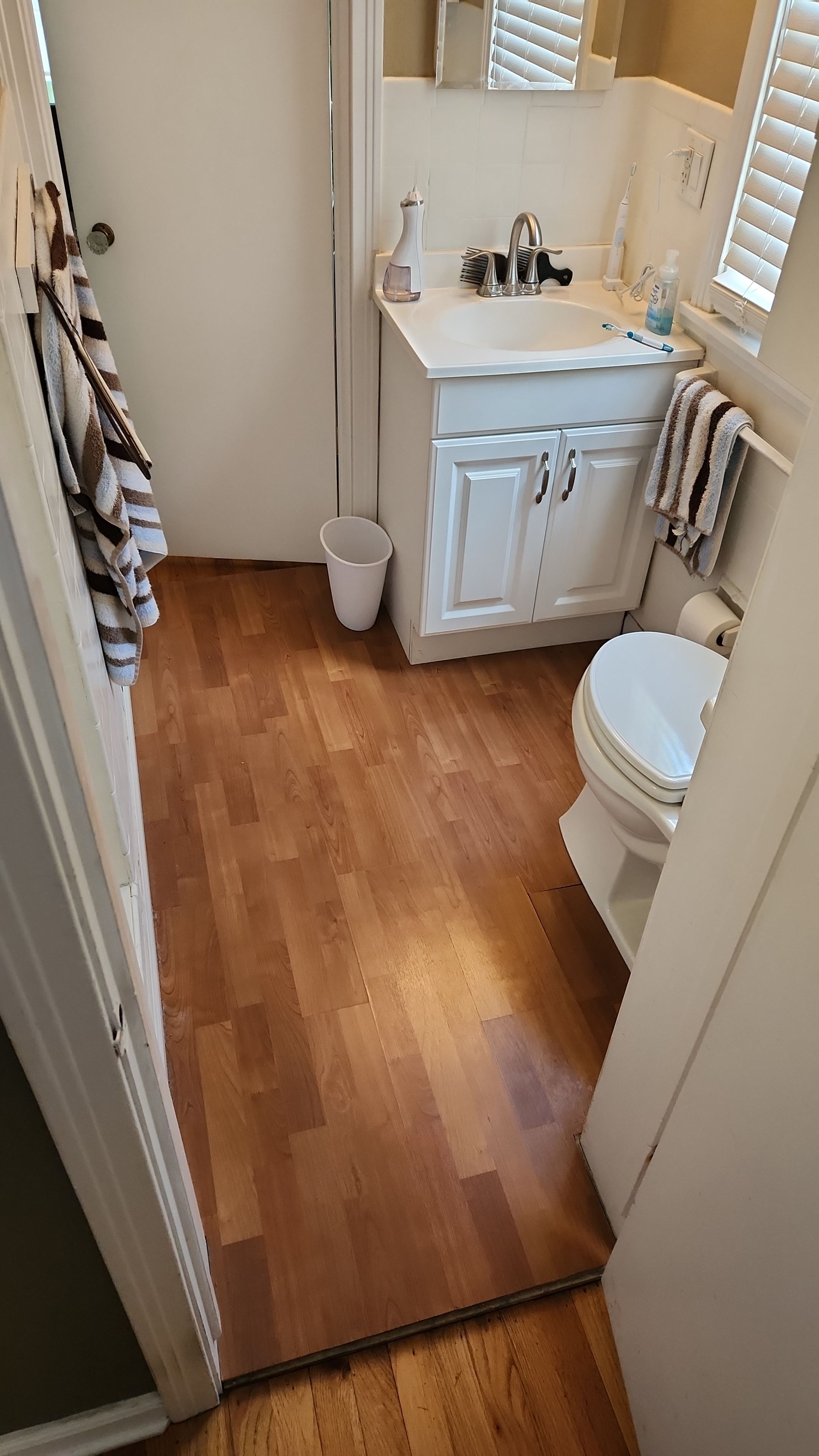 Full bathroom, tile shower, tile floor, tile wainscoting by The Shower Company