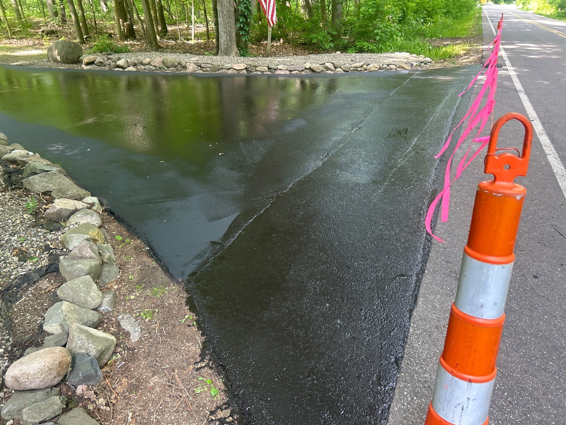 High end residential driveway by Quality Asphalt & Maintenance LLC