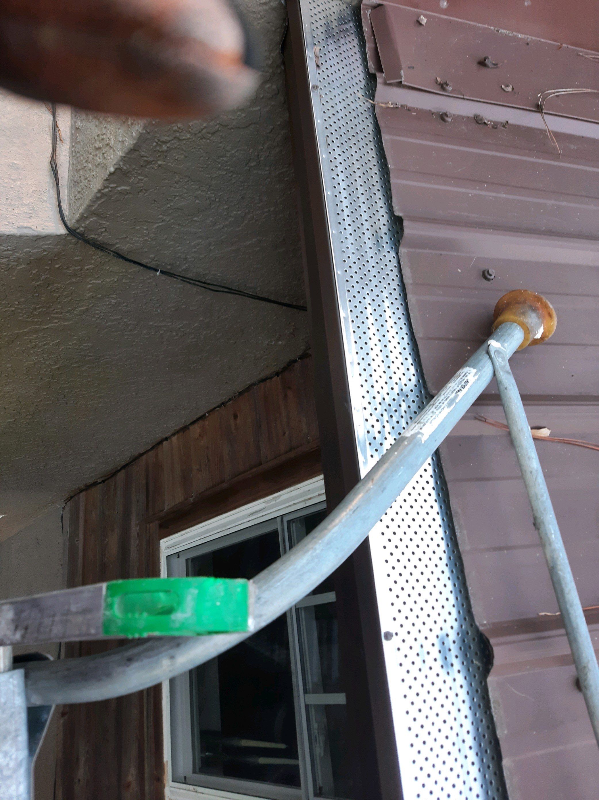 Gutter Installation using Royal Brown K-Style Seamless Gutters and LeafBlaster Pro Gutter Guards by Gutter Professors