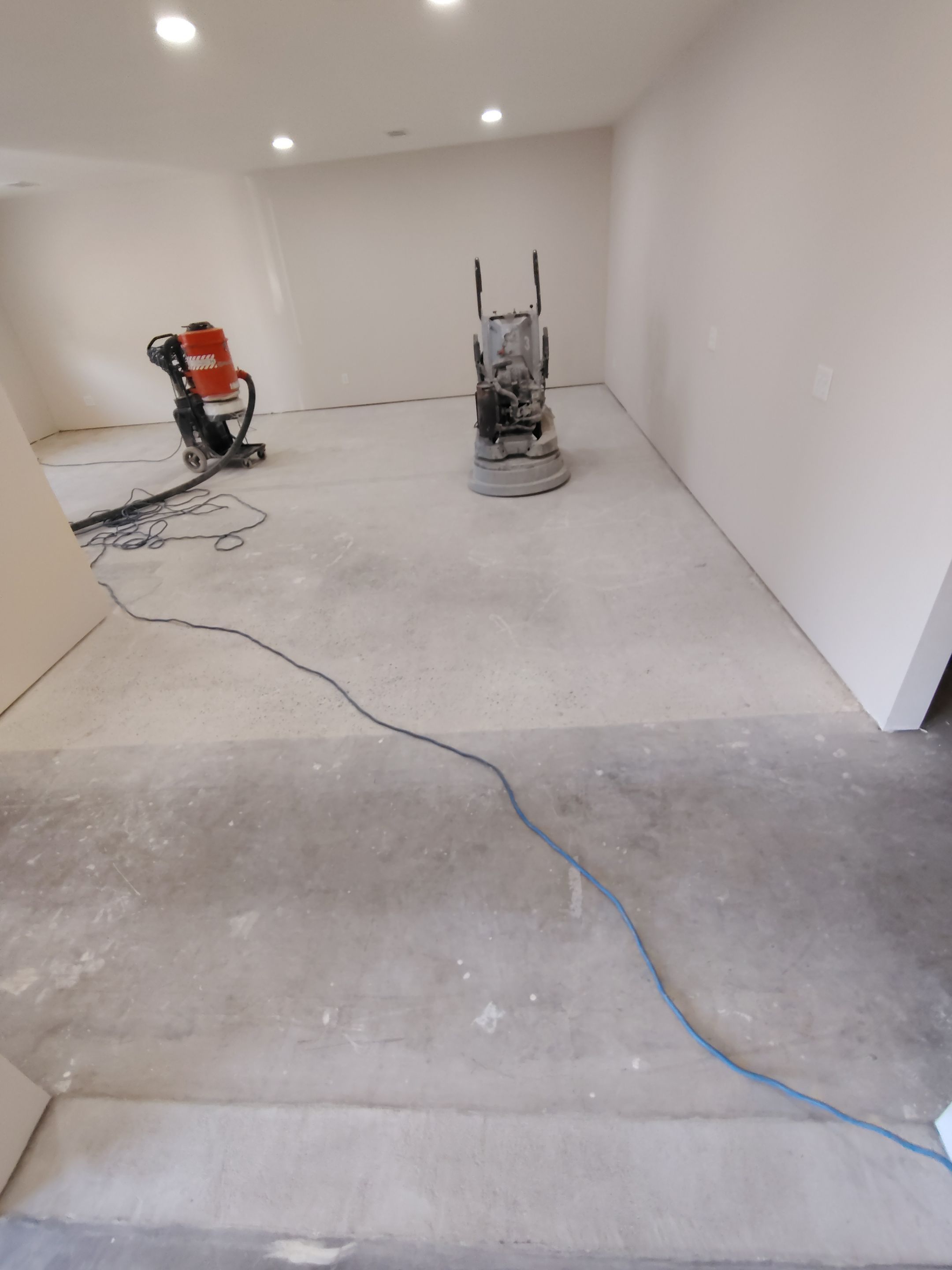 Durable Epoxy Flake Floor Coating for Commercial Workshop by Select Painting, Coatings & Garage Cabinets