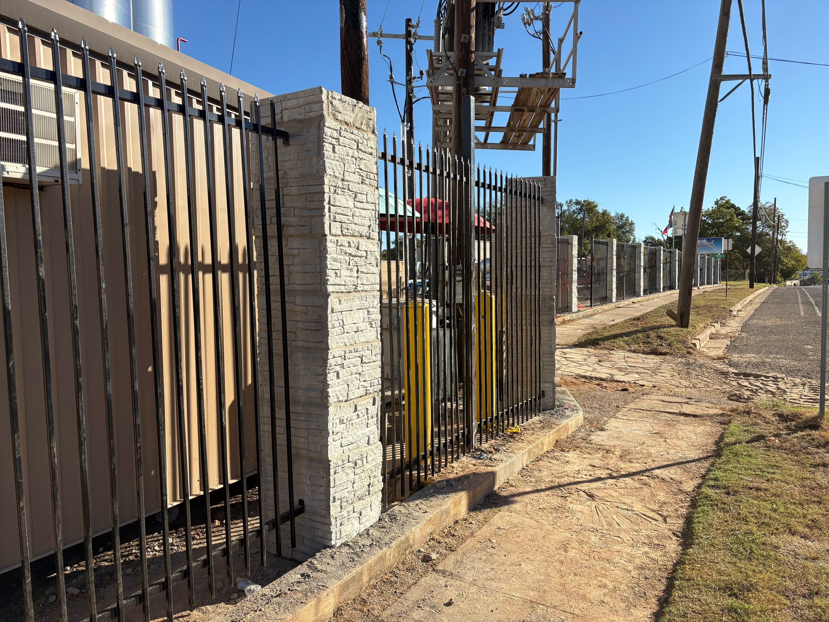Commercial Fencing - Wrought Iron with Concrete columns by 3:16 Roofing and Construction