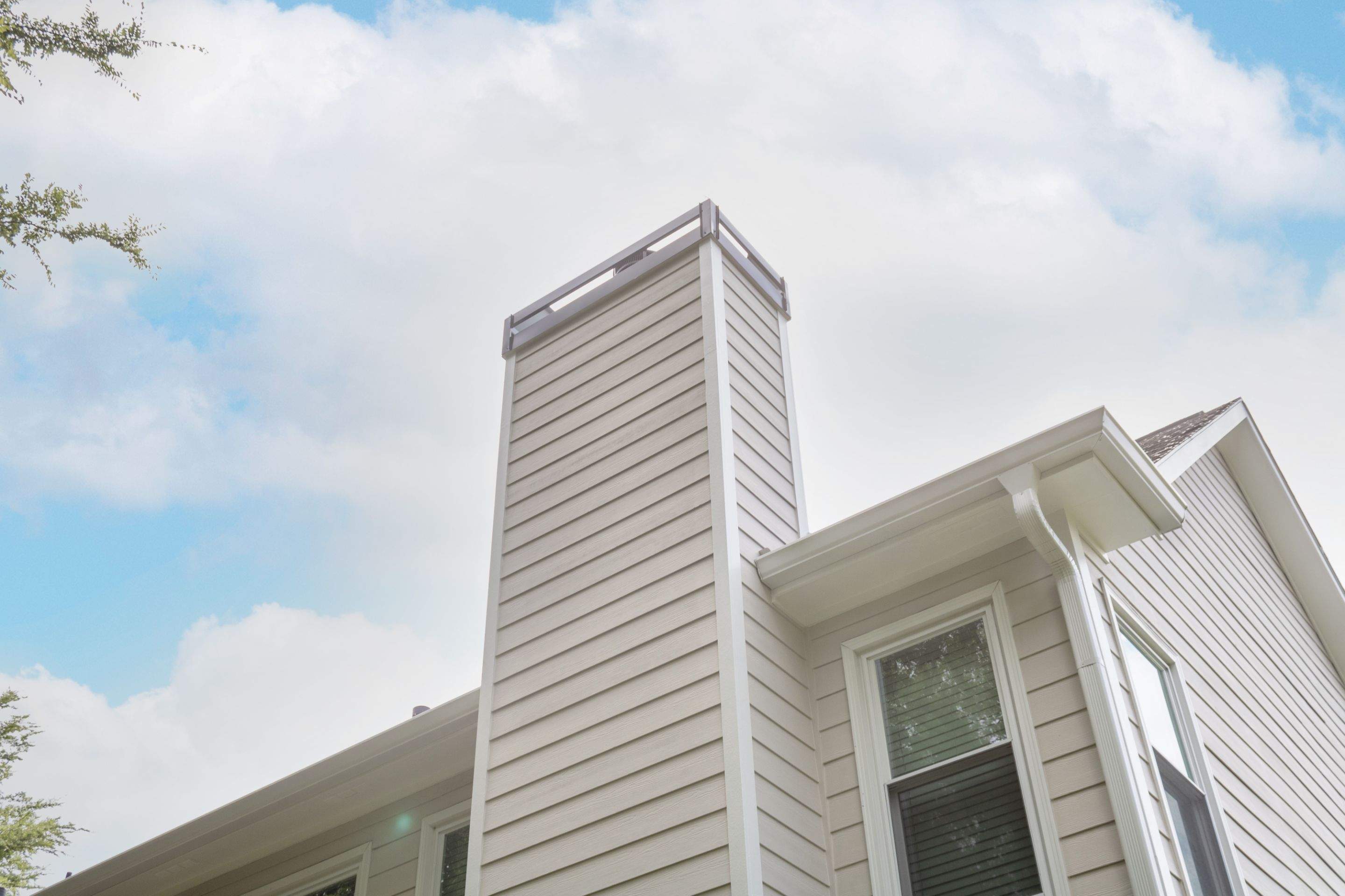 Marietta, GA Chimney Siding, Fascia, and Soffit Replacement using James Hardie Lap Siding, Hardie Trim, and Hardie Panel by Nelson Exteriors 