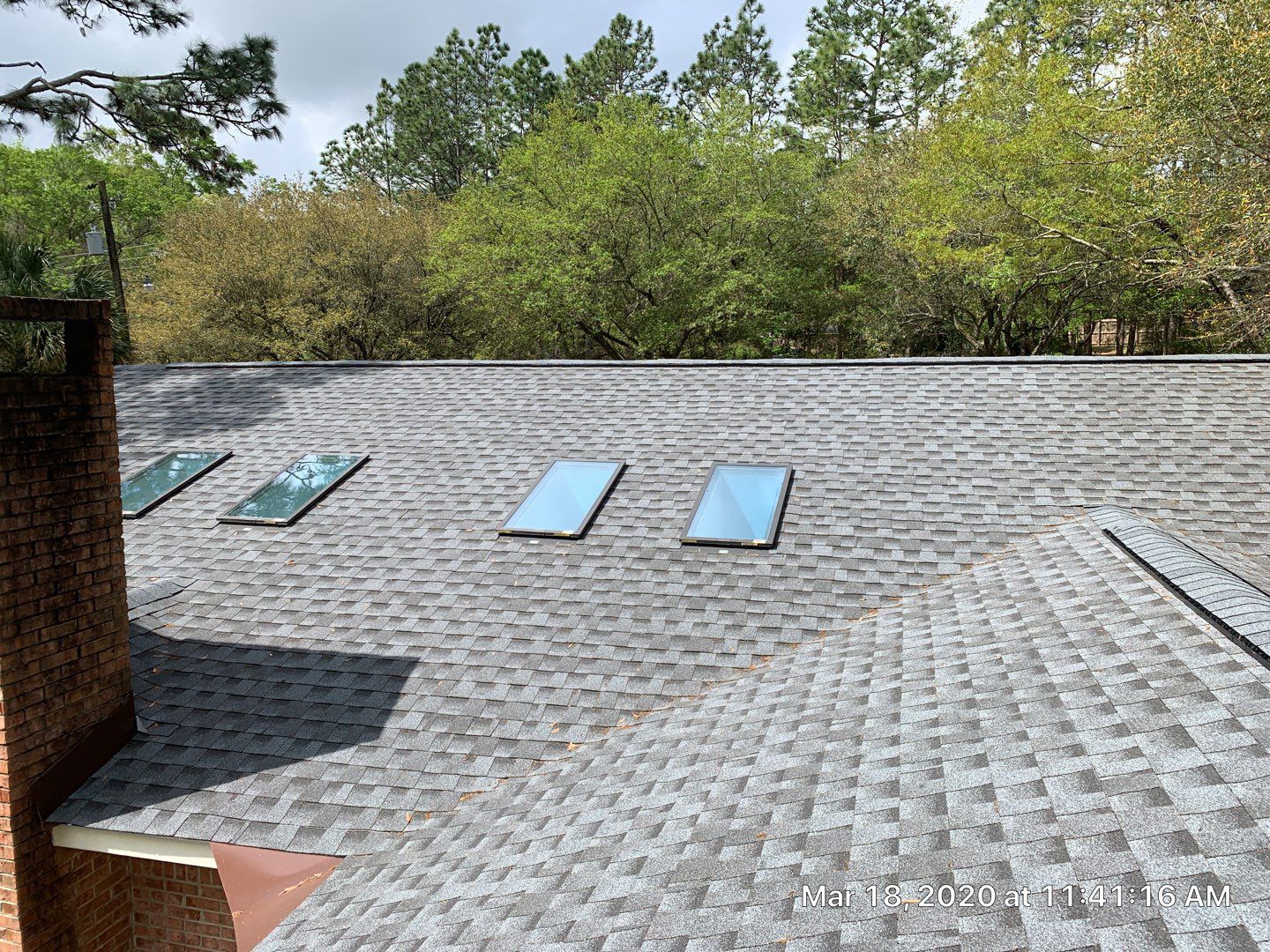 Residential Roofing Installation using Roof Replacement by American Roofing & Construction LLC