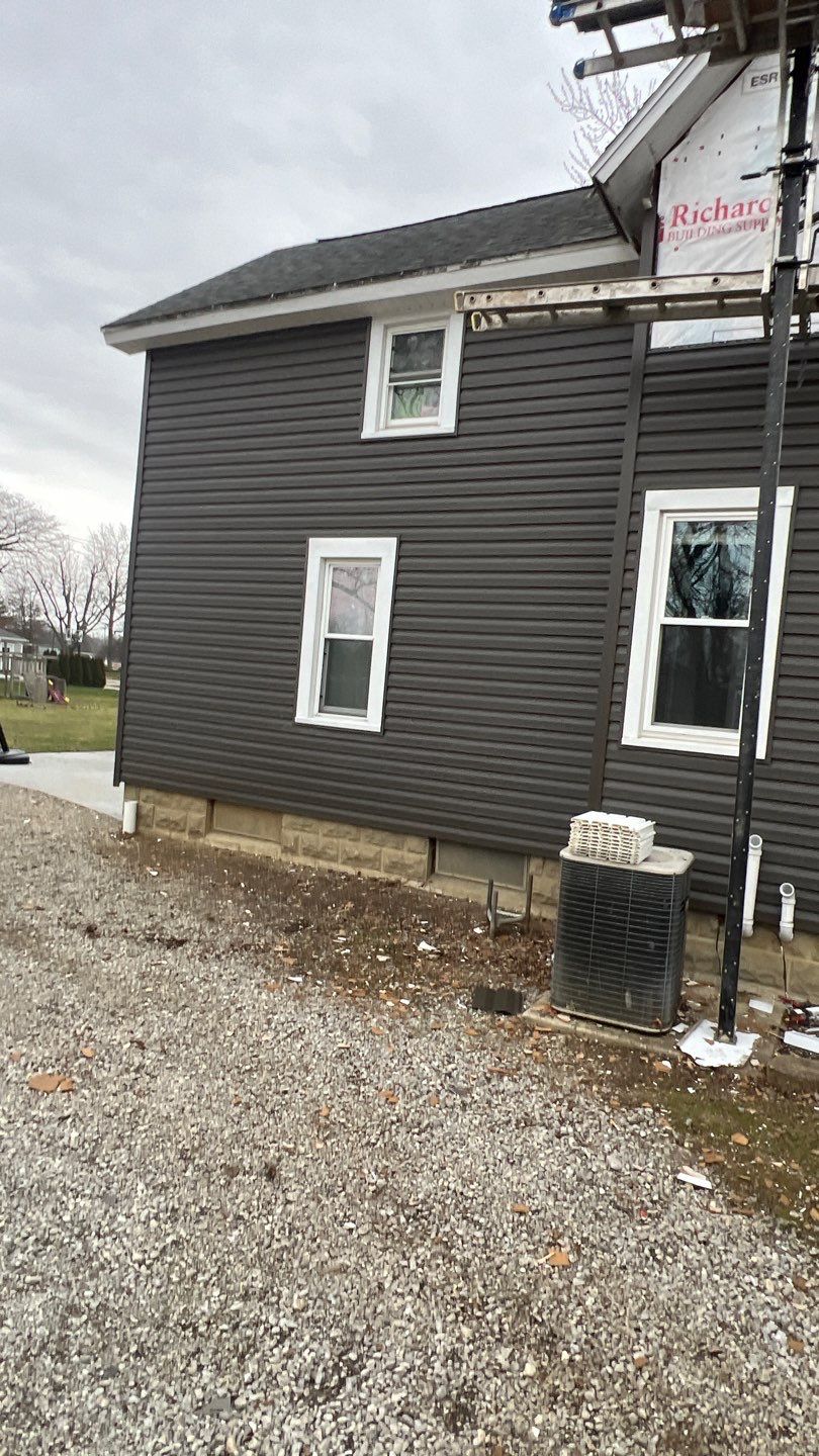 Residential fascia replacement using Exterior Portfolio 4.5 DL - Peppercorn by Nitro Roofing and Construction