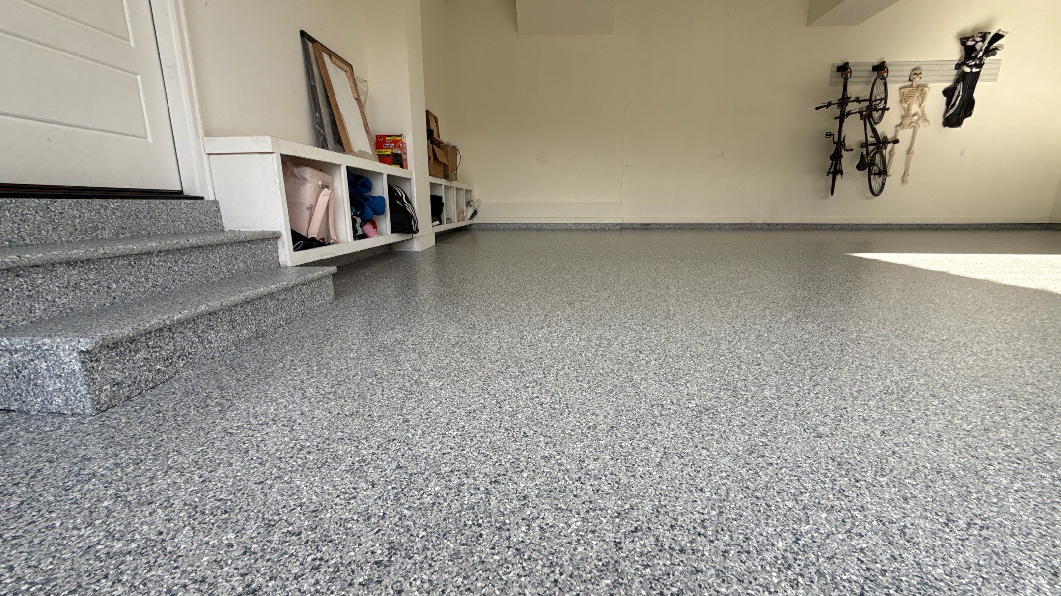 Nick's New Floor & Storage Looks Beautiful by Banner Garage