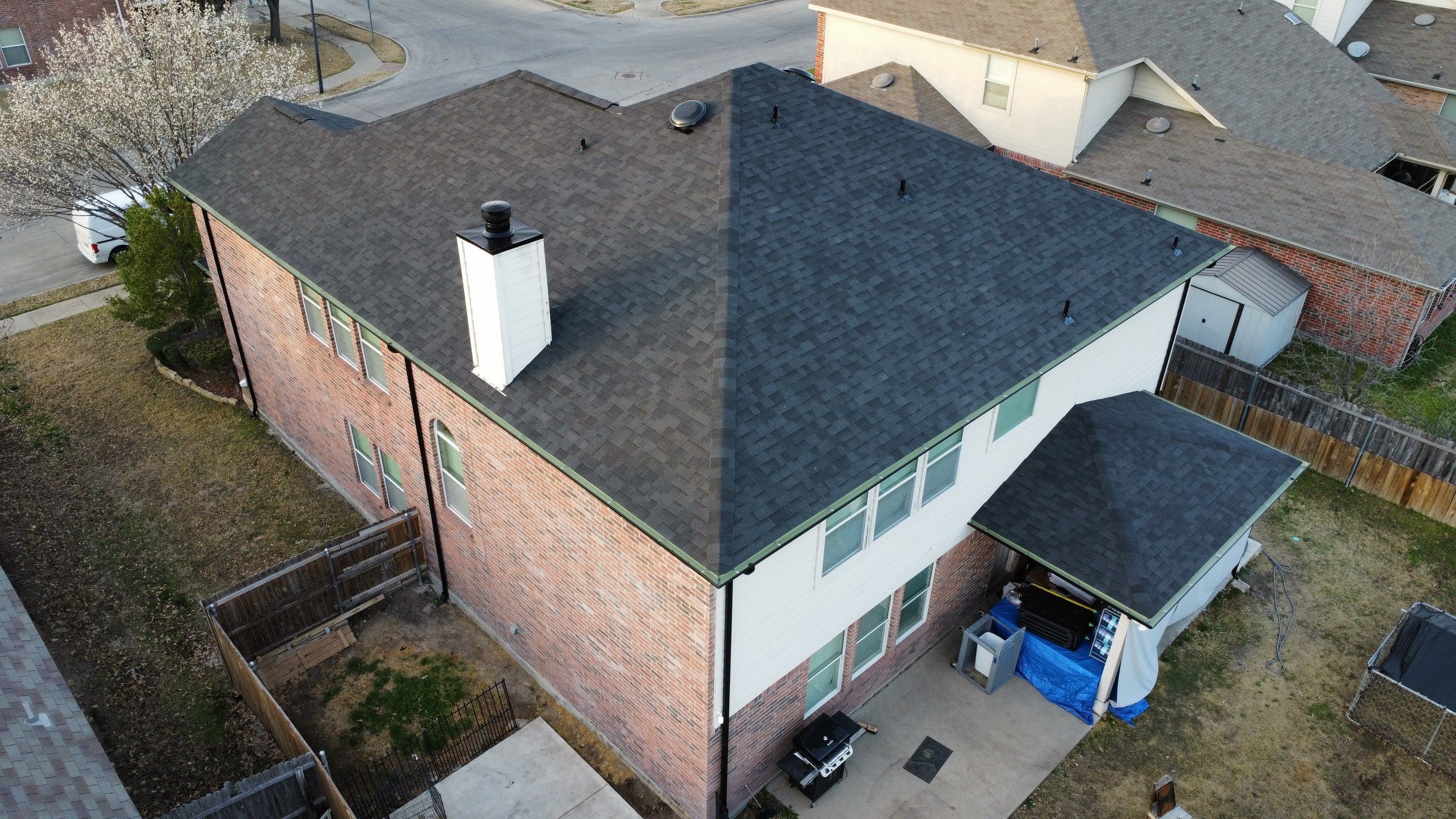 Reroof and Gutters by Berry Good Roofing 