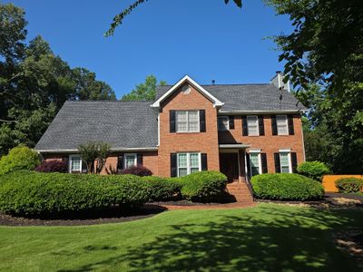 🏡 Brick Home Transformation with Pewter Gray