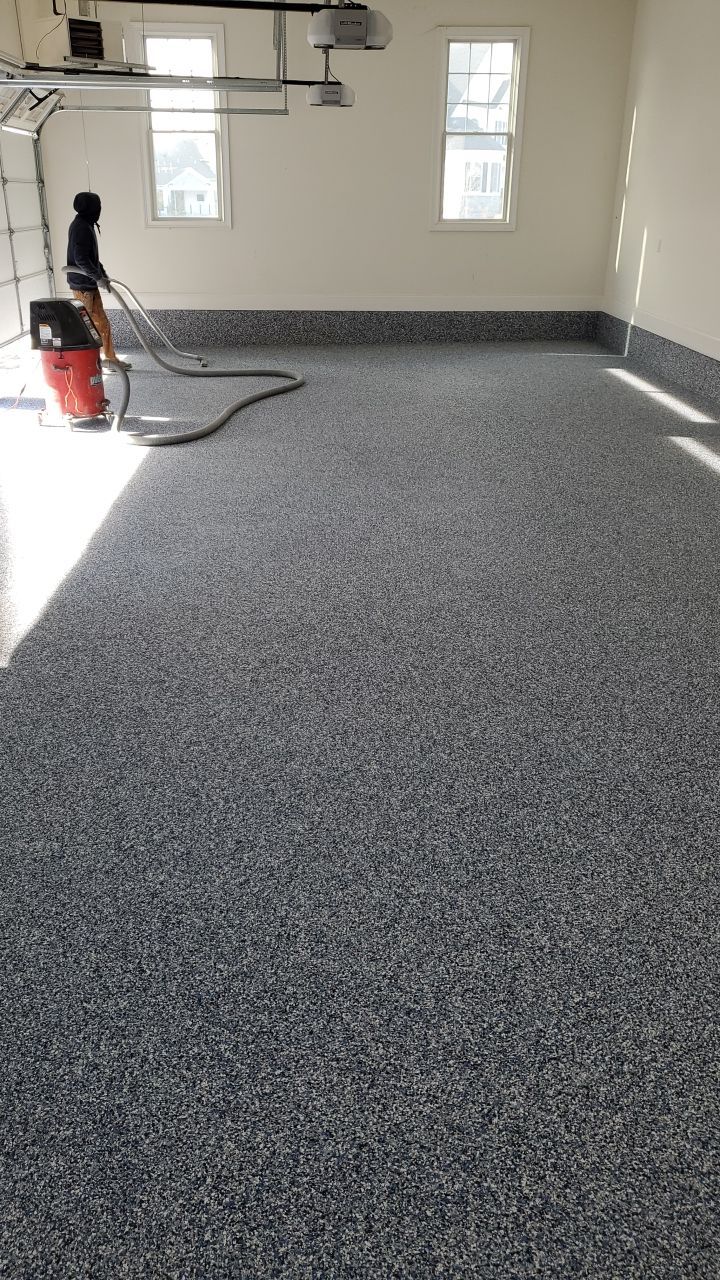 Orbit Penntek Garage Floor by Spectrum Painting, LLC