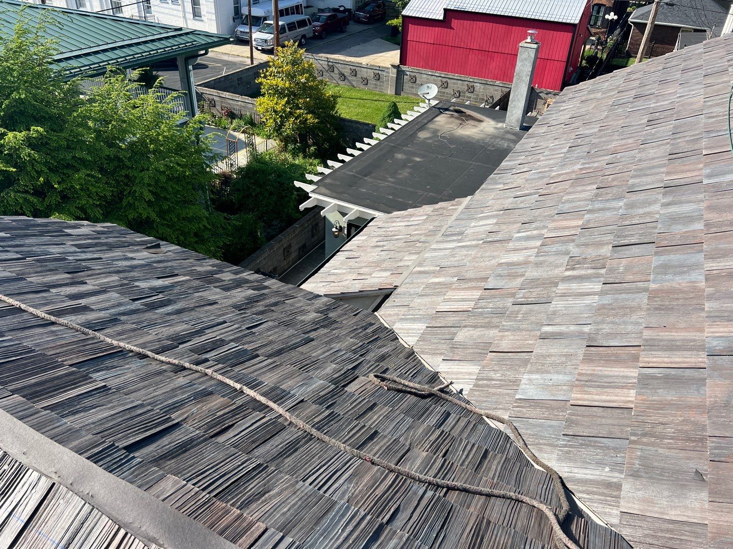 Slate removal/Cedar Shake replacement by Storm Contracting 