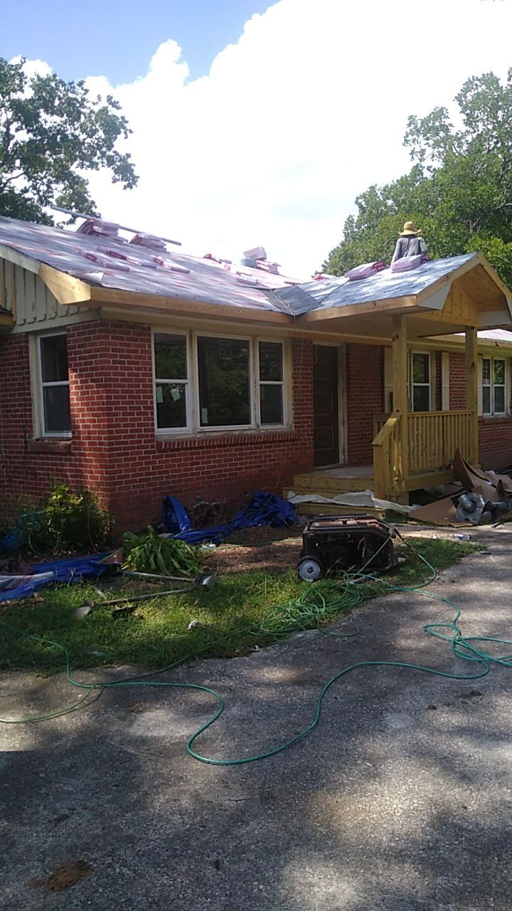 Residential Roofing Installation using Roof Replacement by American Roofing & Construction LLC