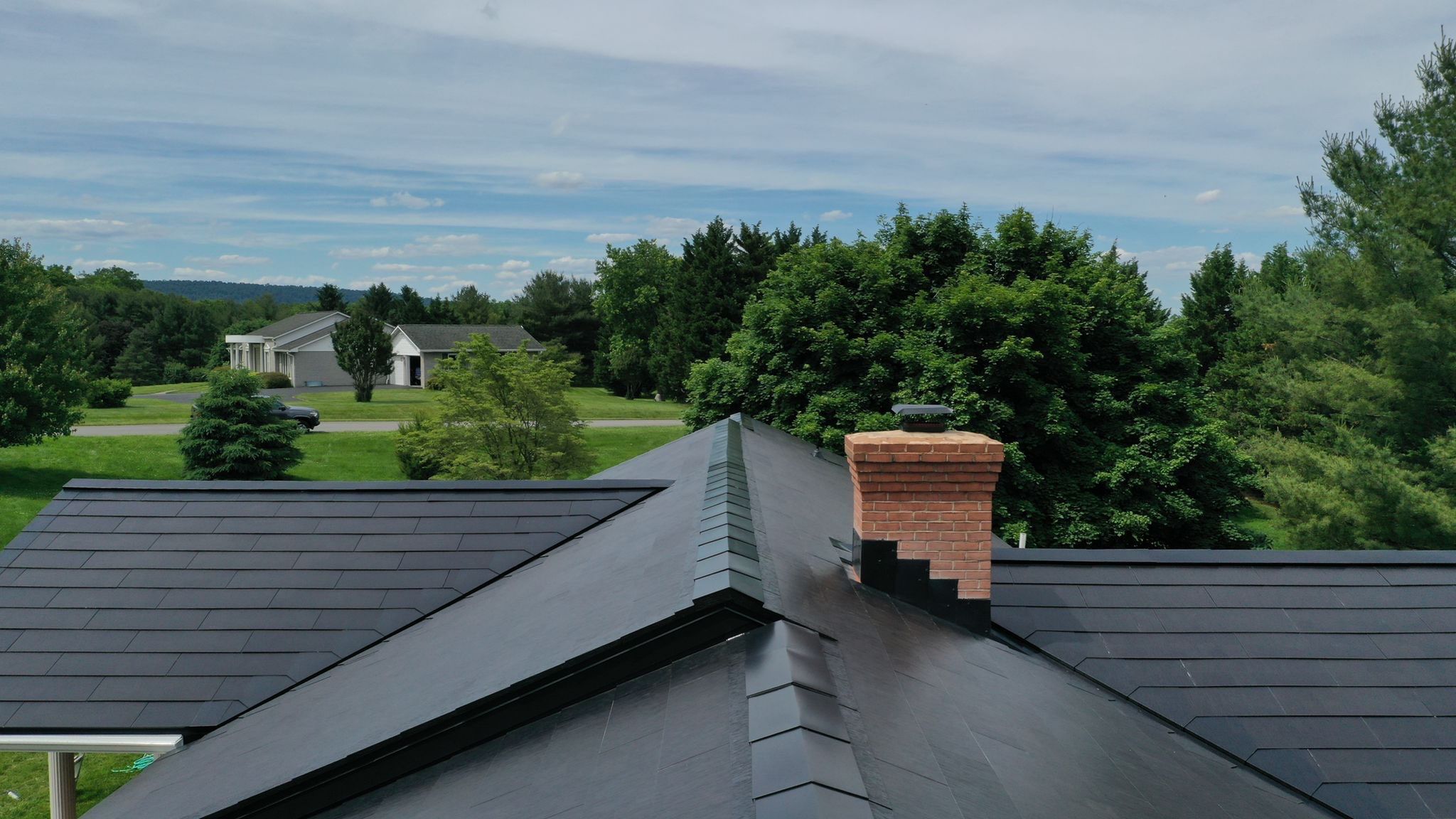 Tesla Solar Roof Installation by American Home Contractors