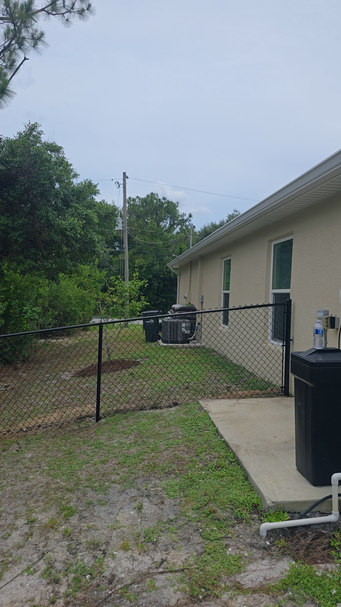 Residential Black Chain-Link Fence Installation in North Port by True Fence LLC