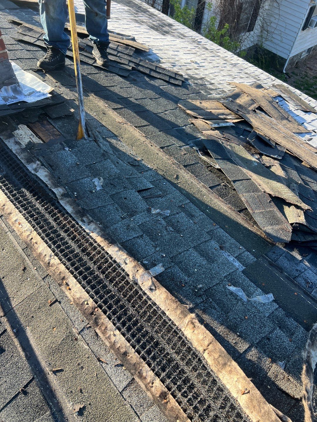 Charcoal Shingles by Reimagine Roofing