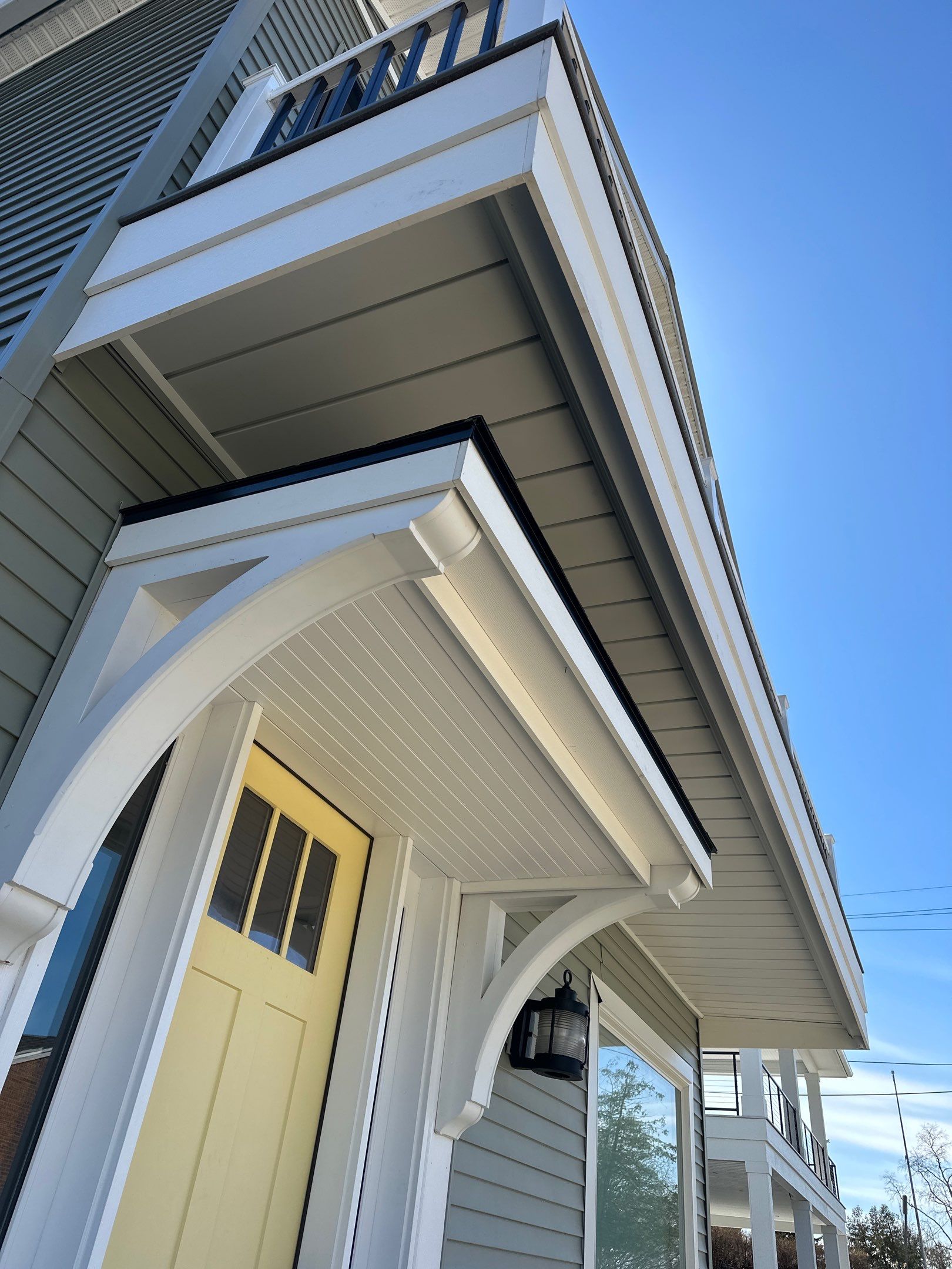 Custom Underdecking System and Soffit Installation in Charlevoix, Michigan by Rainbow Seamless Systems