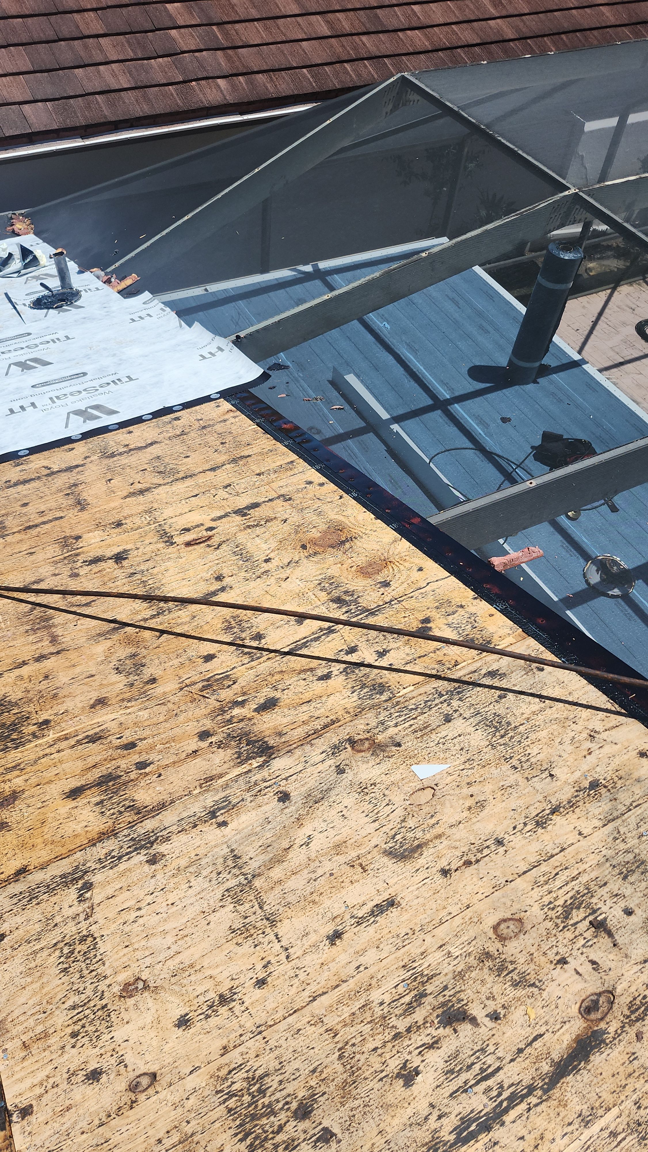 Full Tile Roof Replacement and Sheathing Repair in Deerfield Beach by Aastro Roofing