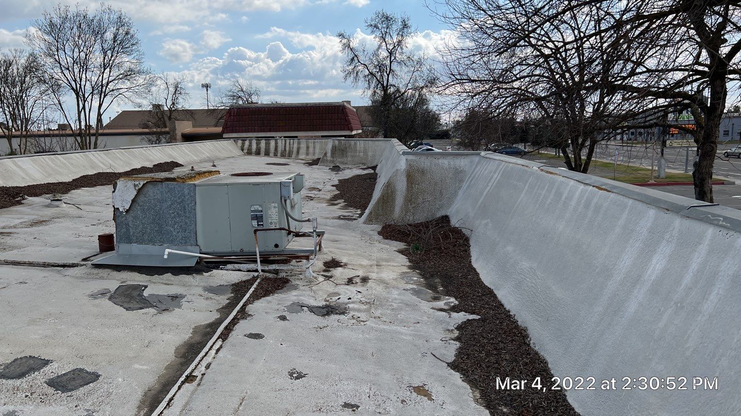 Commercial Roofing Installation using General Coatings acrylic coatings and spray foam by Straight Edge Roofing Inc