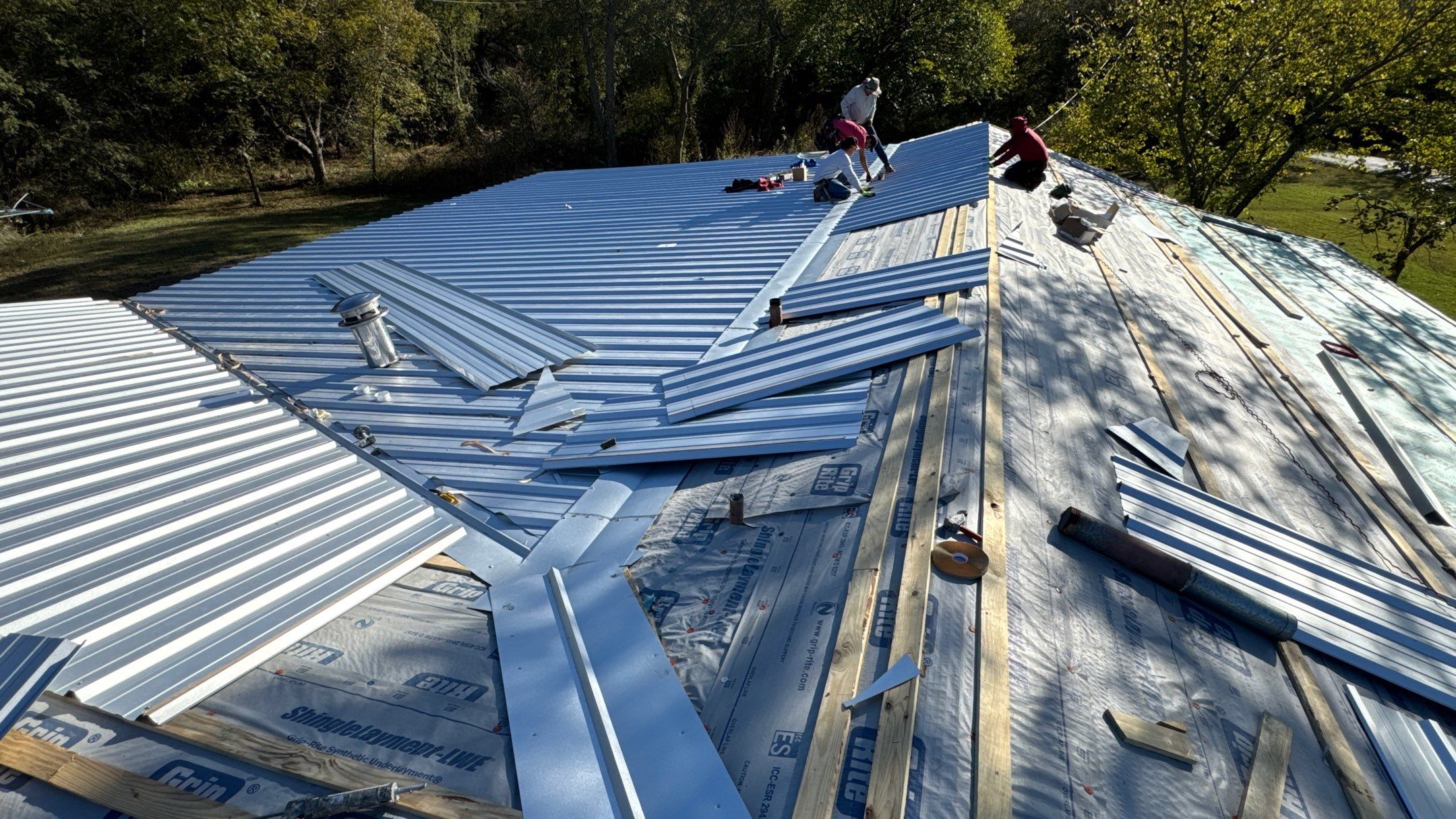 New Metal Roof by Harvey Roofing & Construction