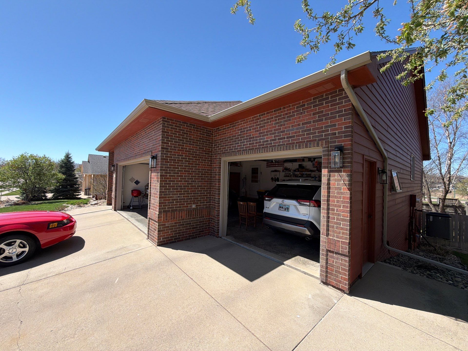 Full Exterior Home Repaint and Siding Refresh in Sioux Falls by Select Painting, Coatings & Garage Cabinets