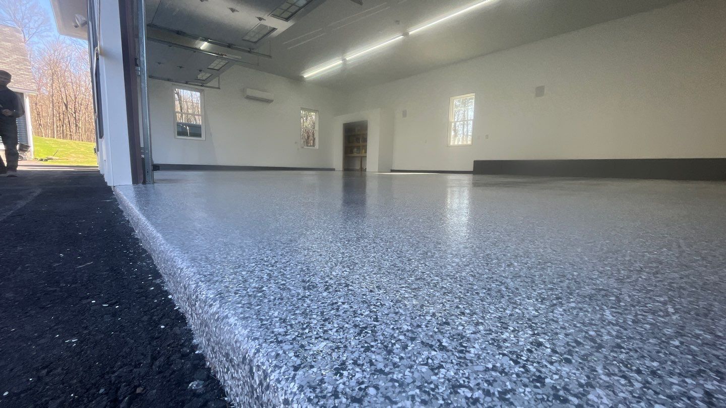 Garage in Londonderry, NH 03053 by Symphony Concrete Coatings