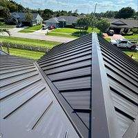 24ga 1.5" Mechanical Seam Dark Bronze by Total Roofing System The Metal Roof Experts