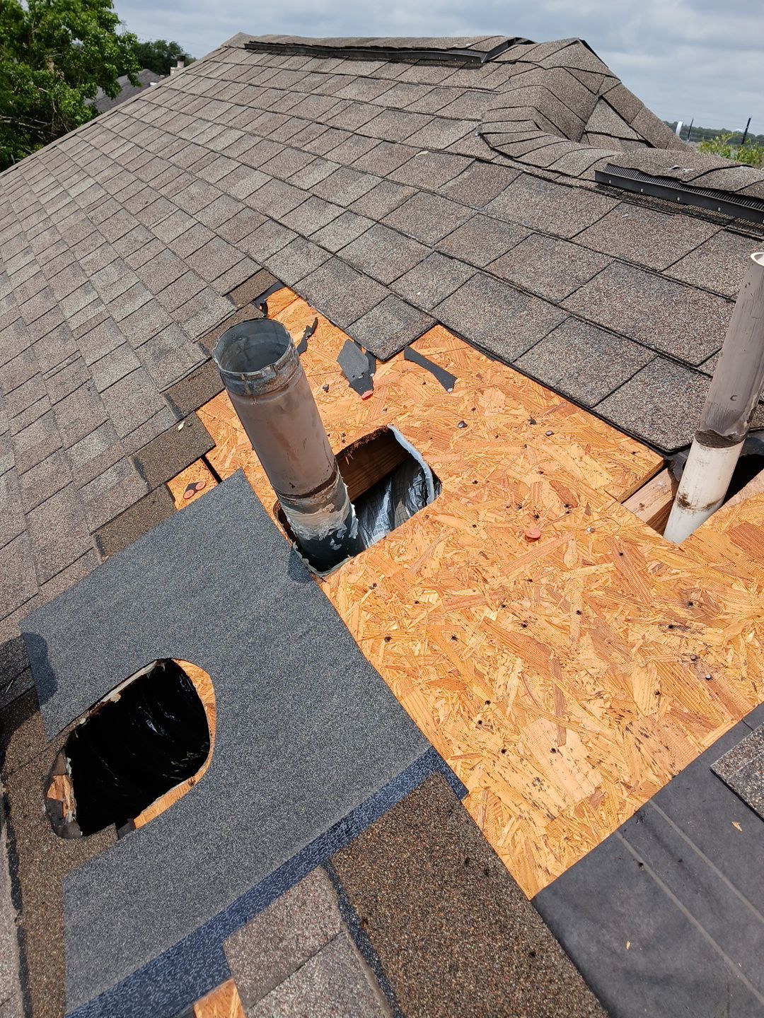 Hail Damage using Owen's Corning Duration (Lifetime) Shingles by Roof Repair Company