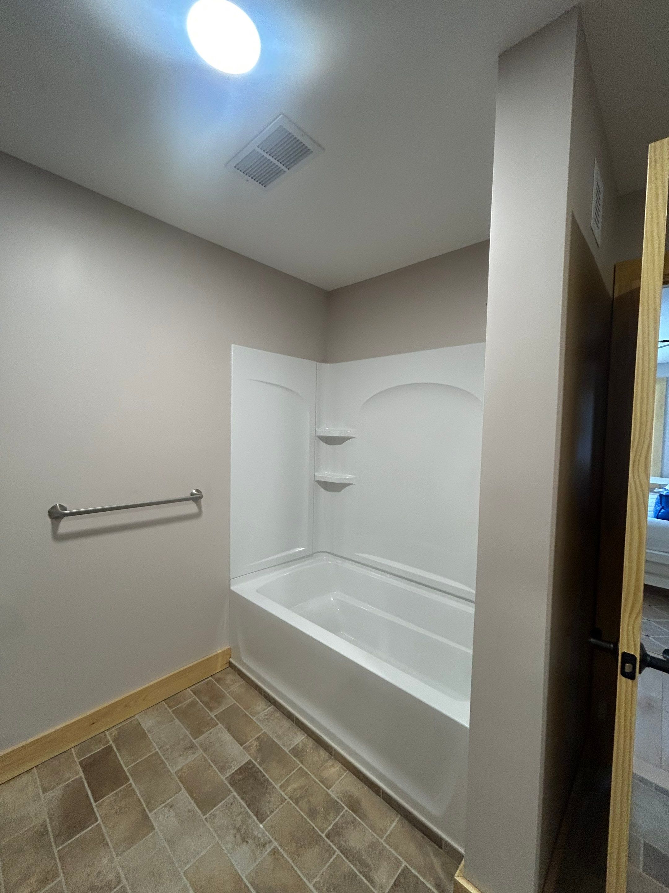 Two Showers using Alumax Shower by Cheshire Glass Company