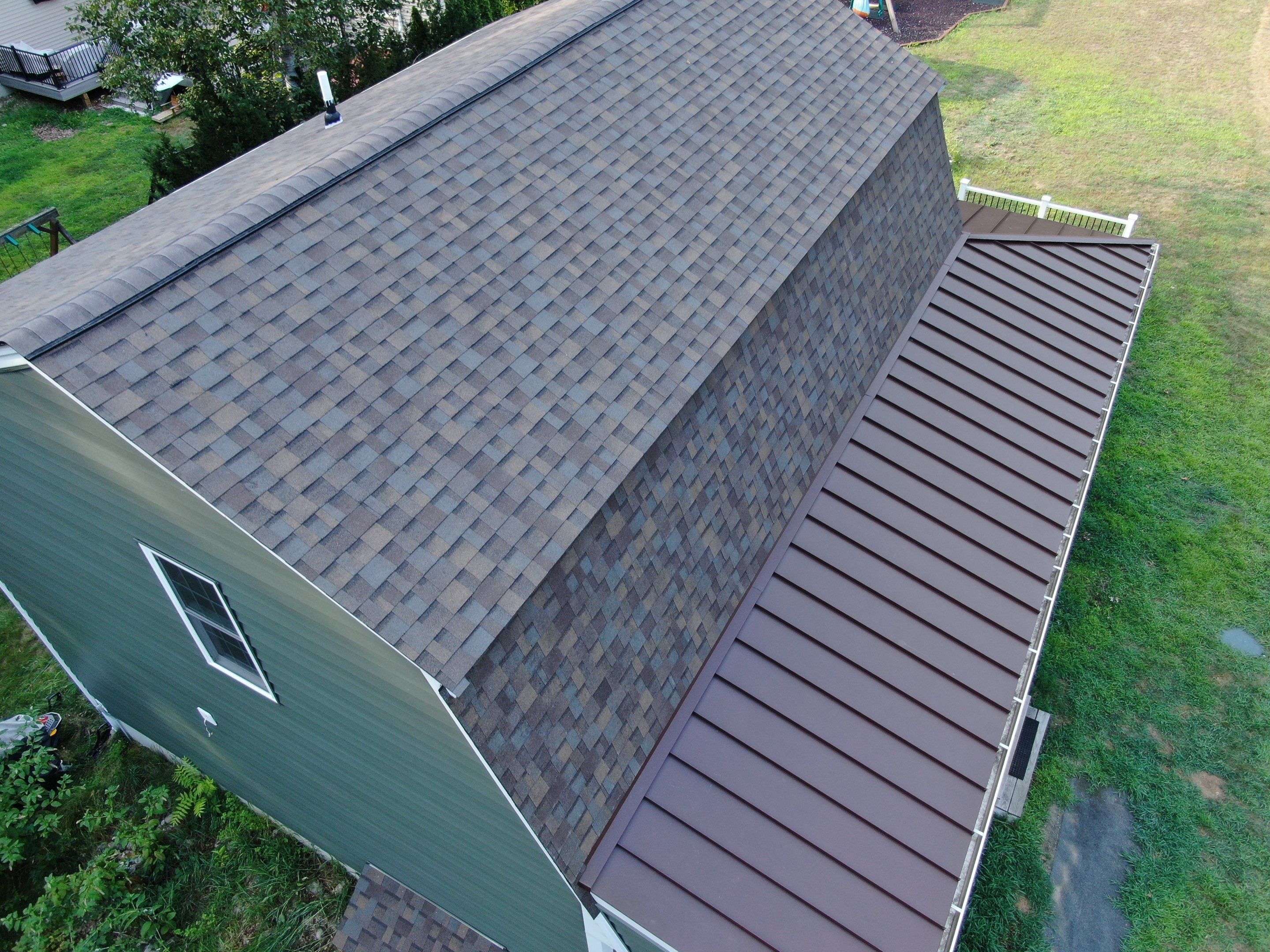 Full Roof Replacement & Farmers Porch Restoration – Asphalt + Standing Seam Metal by Mighty Dog Roofing of Greater Middlesex County