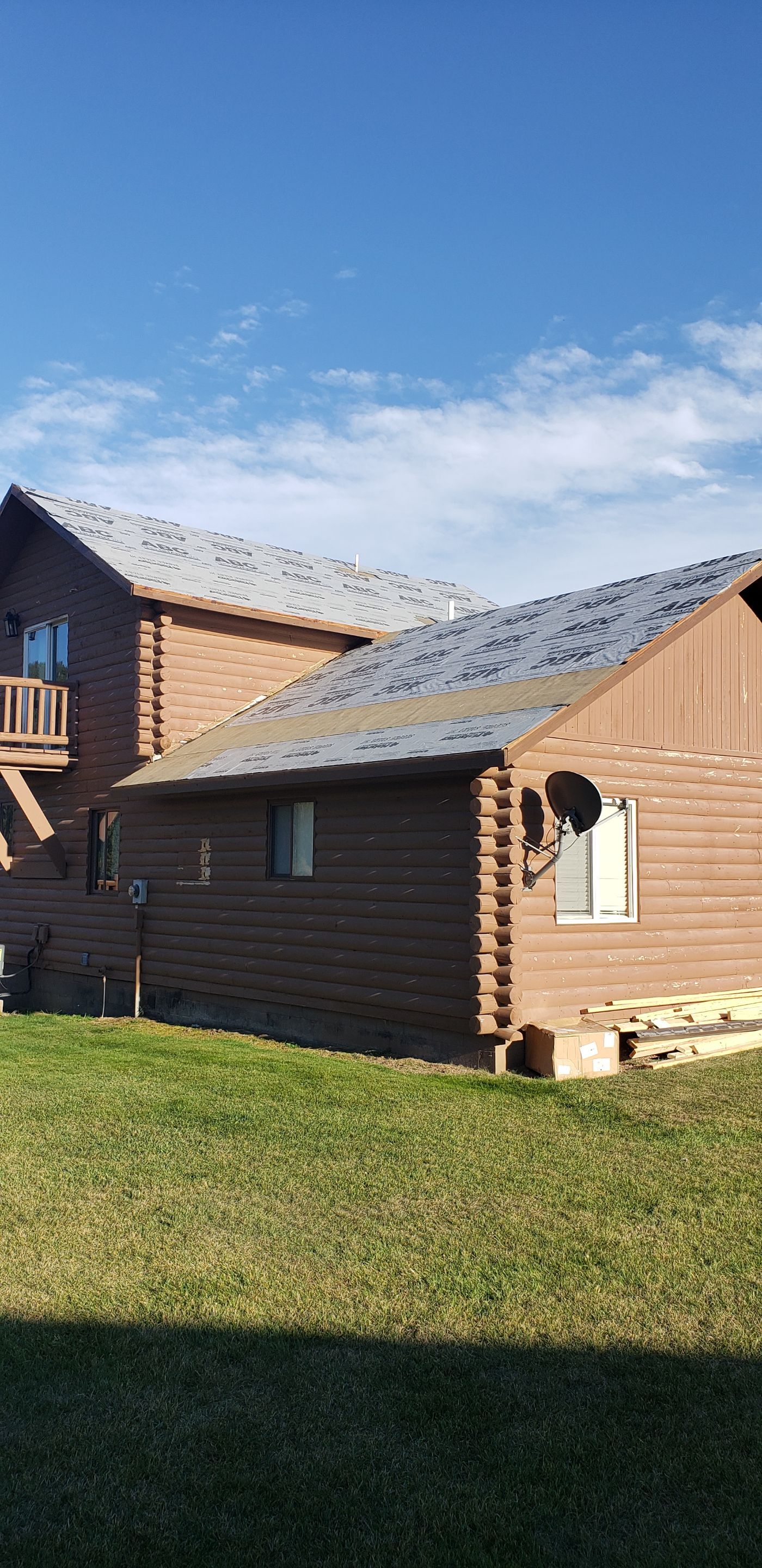 Hill Country Guest Ranch using Steel Roofing, Gutters, Log Cabin Staining by Lightning Exteriors