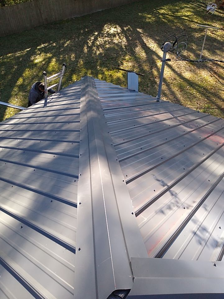 Residential Roofing Installation using Roof Replacement by American Roofing & Construction LLC