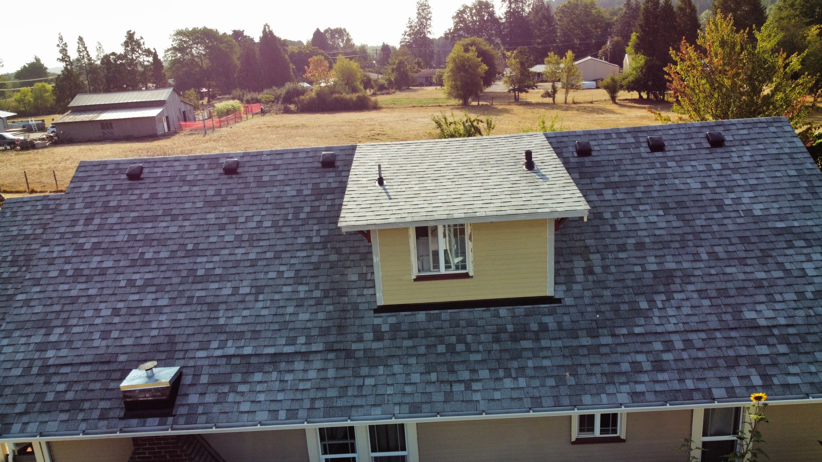 Residential Roofing Installation using IKO Dynasty (Color: Frostone Grey) by Orezona Building & Roofing Company, Inc.
