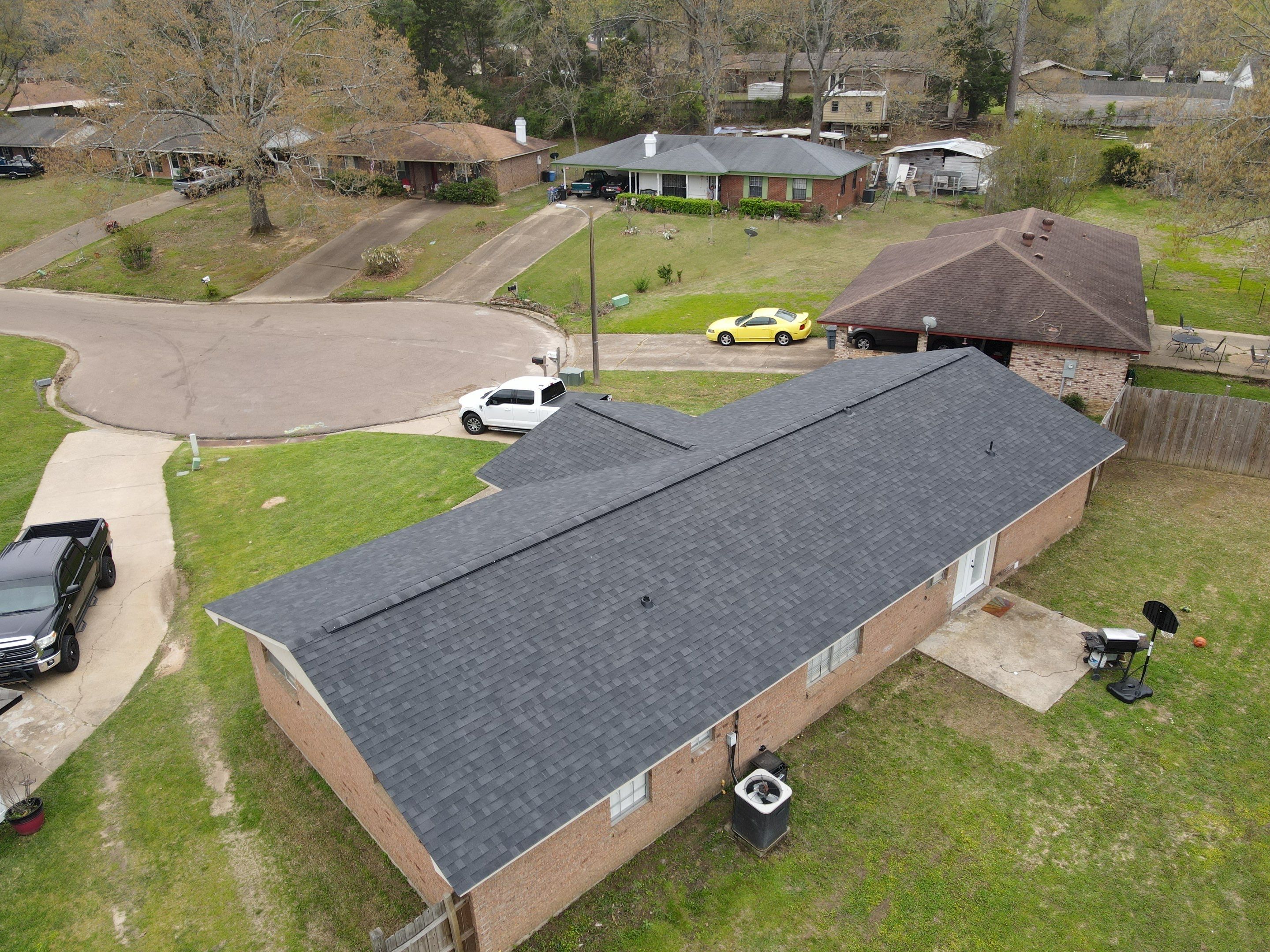 Residential Roofing Installation using Owens Cornering Onyx Black by Roberson Construction LLC