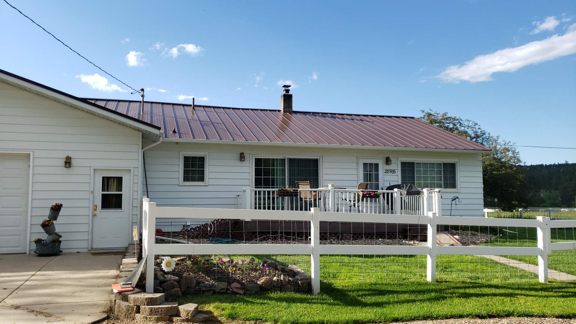 Ribbed Steel Roof Farmhouse Style by Weather-Tite Exteriors LLC