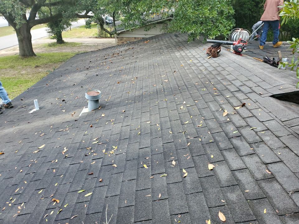 Residential Roofing Installation using Roof Replacement by American Roofing & Construction LLC