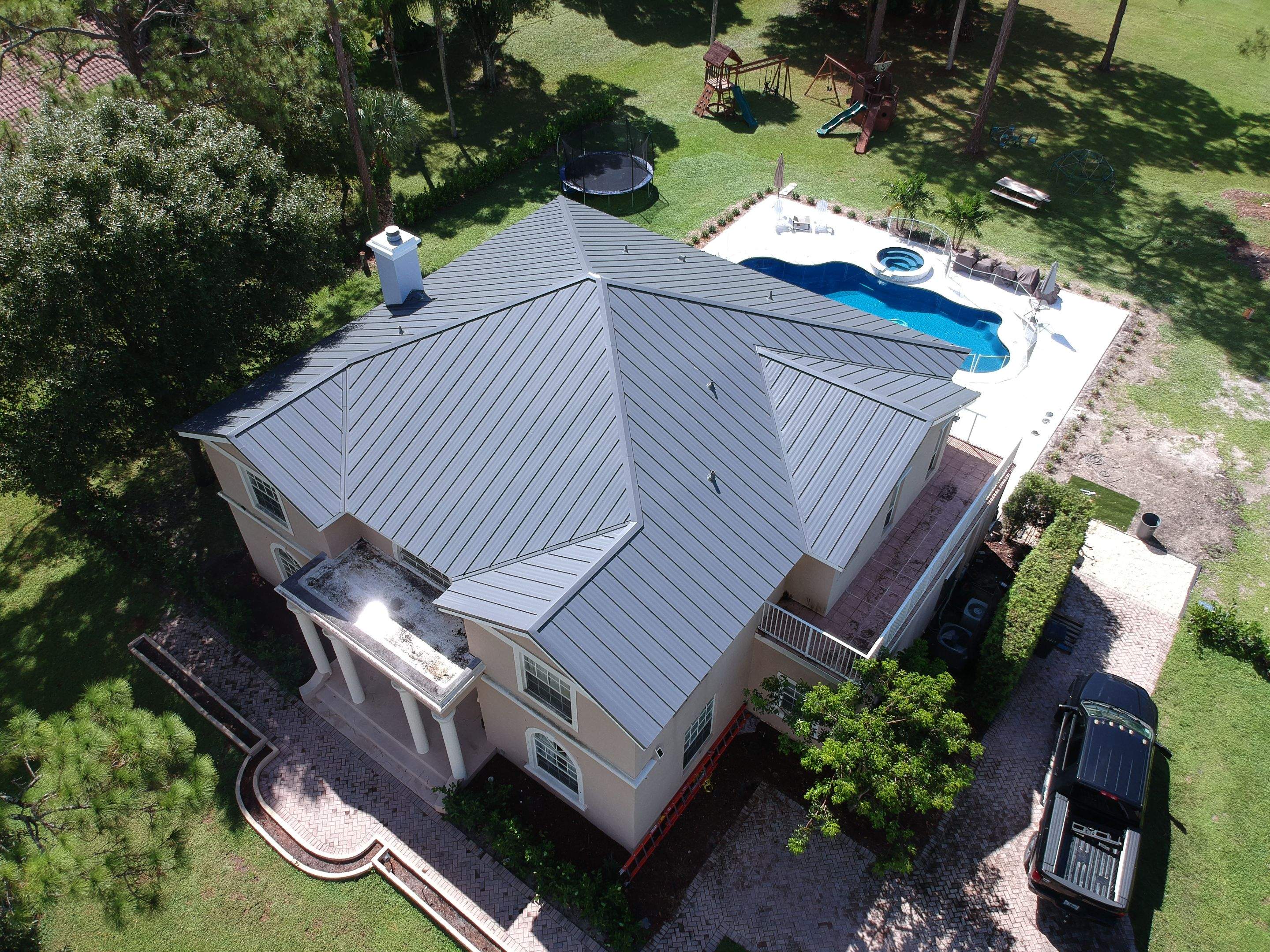 Residential Roofing Installation using 1" Nail strip metal roof by BLUES BROTHERS CONSTRUCTION CORP