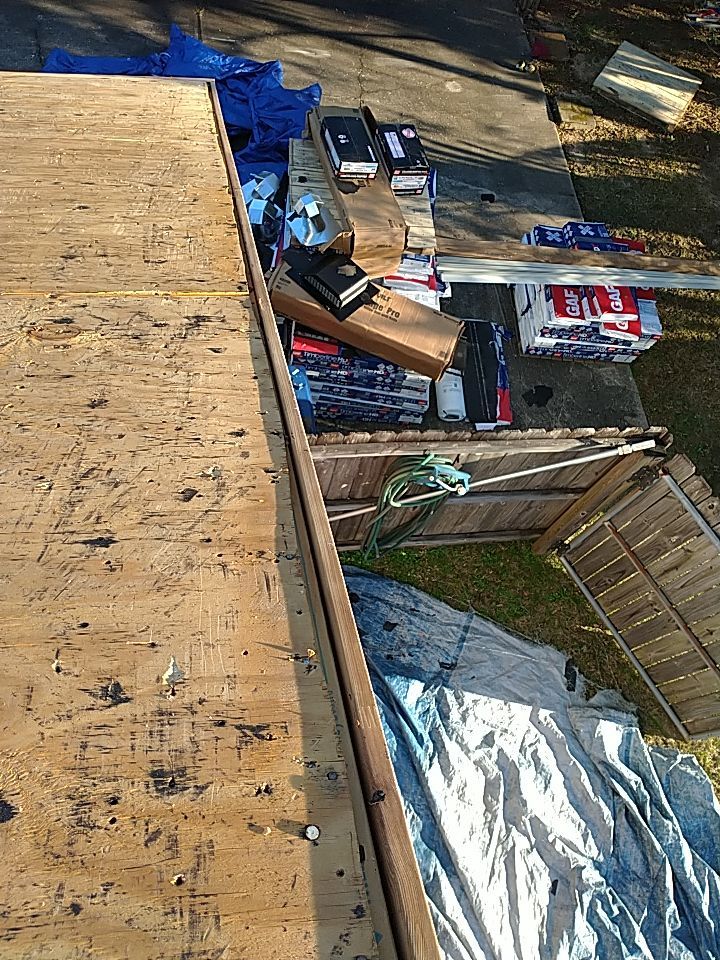 Residential Roofing Installation using Roof Replacement by American Roofing & Construction LLC