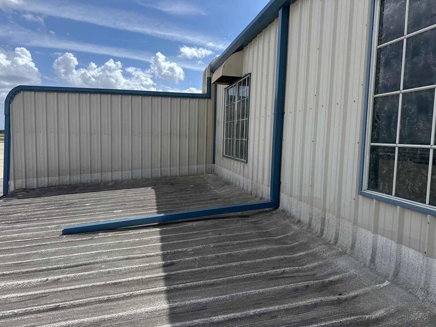Airport Building Gutter Repair by CES Roofing