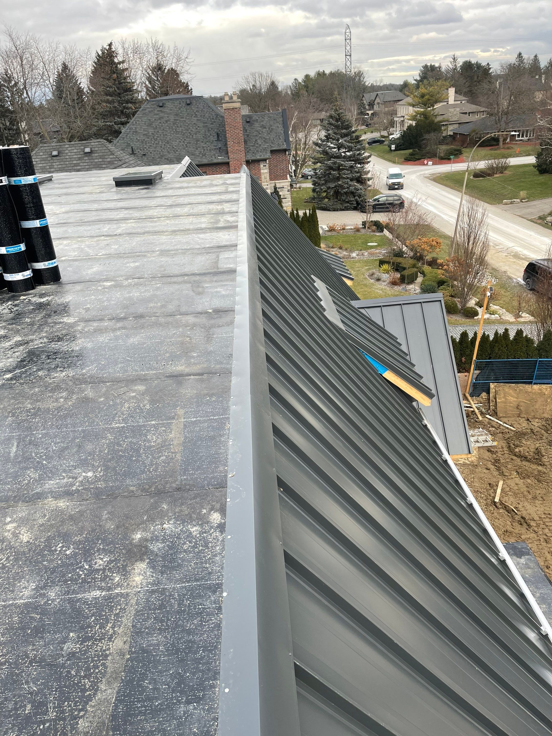 New Home Construction using 16" Standing Seam Panels by Jay Carter Roofing & Sheet Metal